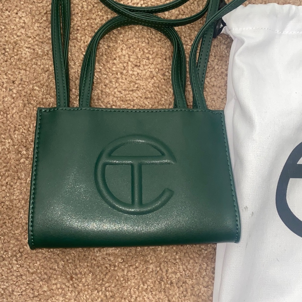 Small olive green bag.